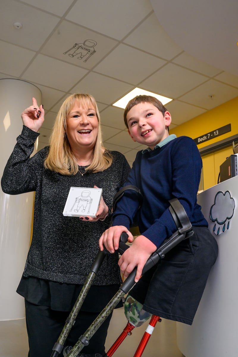 Tony Hudgell, pictured with his mother Paula, has been on a ceiling tile in a new unit at Evelina London Children’s Hospital in a thank you for his fundraising efforts
