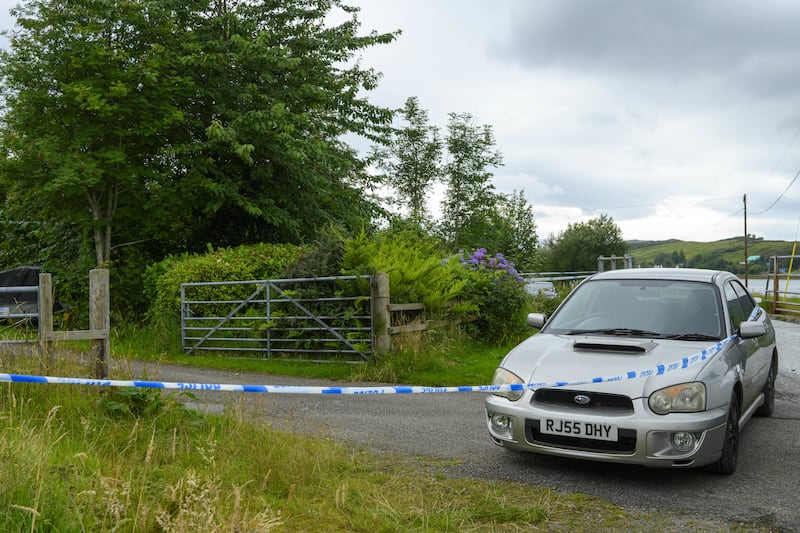 Police investigating the scene of the shooting in Dornie, Wester Ross