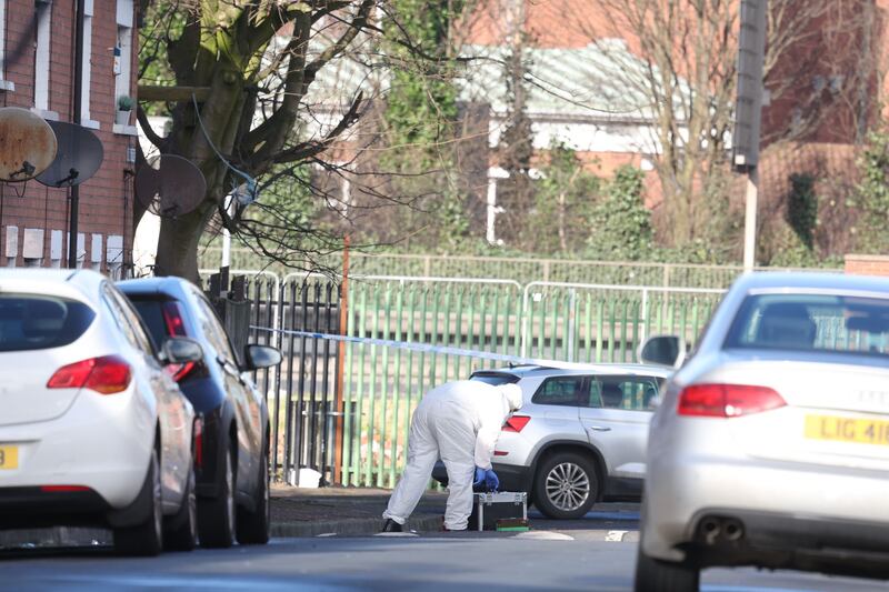 Police and Army Technical Officers remained at the scene on Empire Street on Wednesday afternoon. PICTURE: MAL MCCANN