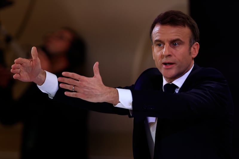 French President Emmanuel Macron gestures during the press conference (Aurelien Morissard/AP)