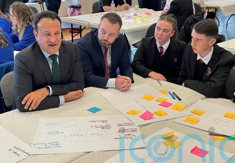 Former Taoiseach Leo Varadkar and SDLP leader and Foyle MP Colum Eastwood speaking to pupils fro St Brigid's College, Derry and Thursday's New Ireland Commission event in Derry's Playhouse on Thursday.