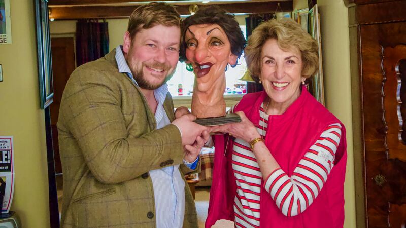 Angus and Edwina posing with a puppet version of Edwina Currie.