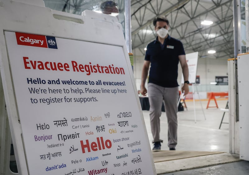 A reception centre wildfire evacuees (Jeff McIntosh/Canadian Press/AP)