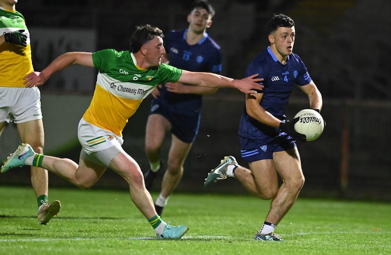 Michael Rafferty of Killyclogher in action against Cormac McEnroe of Carrickmore in the Tyrone GAA Senior Championship Q/F at Healy Park Omagh.