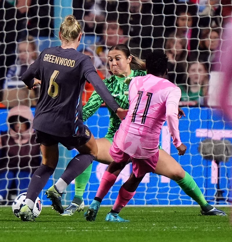 Thembi Kgatlana, right, scores for South Africa against England