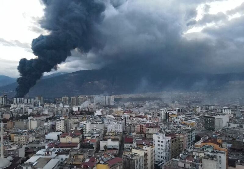 A large fire that broke out at a section of a port in the earthquake-stricken town of Iskenderun, southern Turkey, continues to rage (Serdar Ozsoy/Depo Photos via AP)
