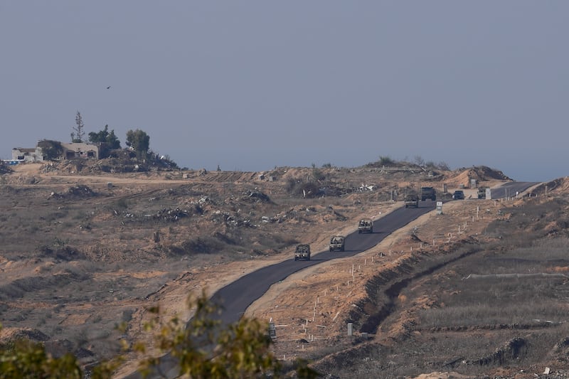 Israeli armoured vehicles near the Gaza Strip (Matias Delacroix/AP)