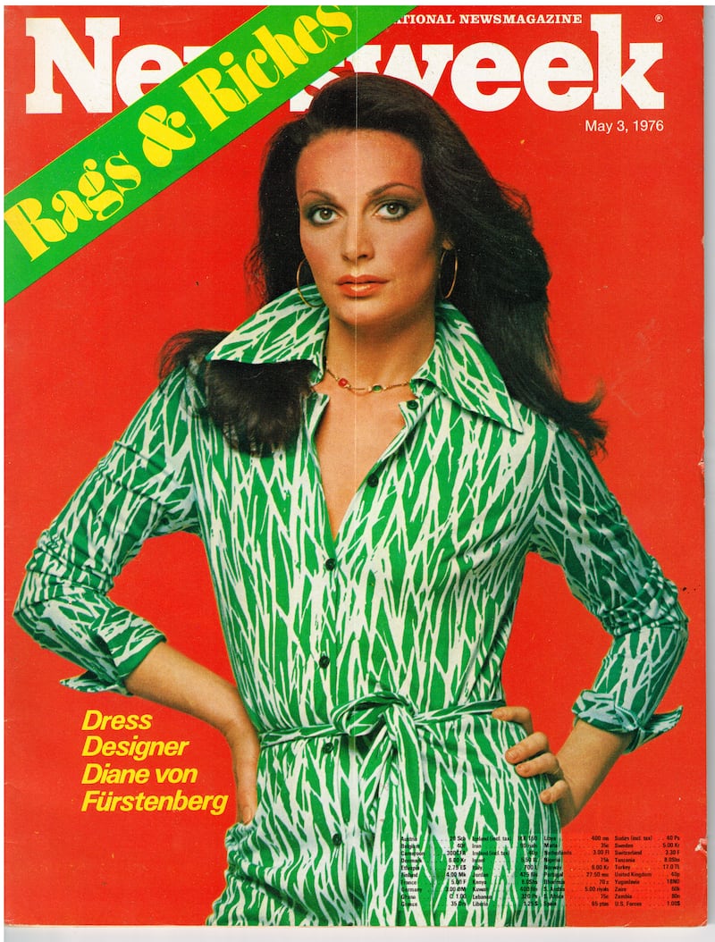 von Furstenberg showing off the wrap dress on the cover of Newsweek in 1976