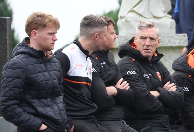 Armagh Manager Kieran McGeeney with his players   at the Funeral of  Crossmaglen Rangers player Caolan Finnegan on Monday, Caolan received a lap of honour at Crossmaglen ground before the funeral at St Patrick’s Church.
PICTURE COLM LENAGHAN