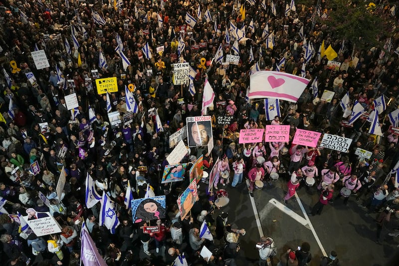 Israelis protest against Prime Minister Benjamin Netanyahu’s government and call for the release of hostages held in the Gaza Strip by Hamas in Tel Aviv (Tsafrir Abayov/AP)