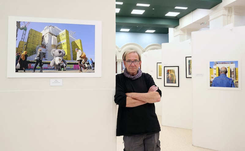 Photographer Dermot Blackburn at his exhibition of the Primark fire on display at 2 Royal Avenue in Belfast.
PICTURE COLM LENAGHAN