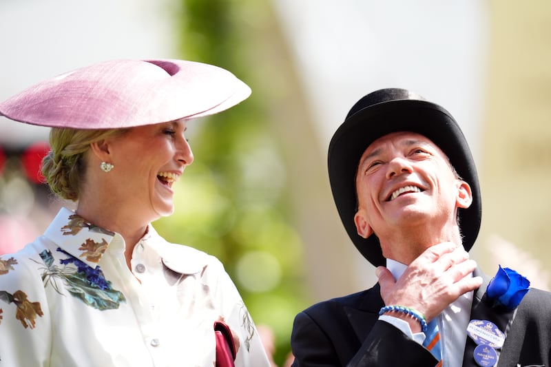 The Duchess of Edinburgh shares a laugh with jockey Frankie Dettori