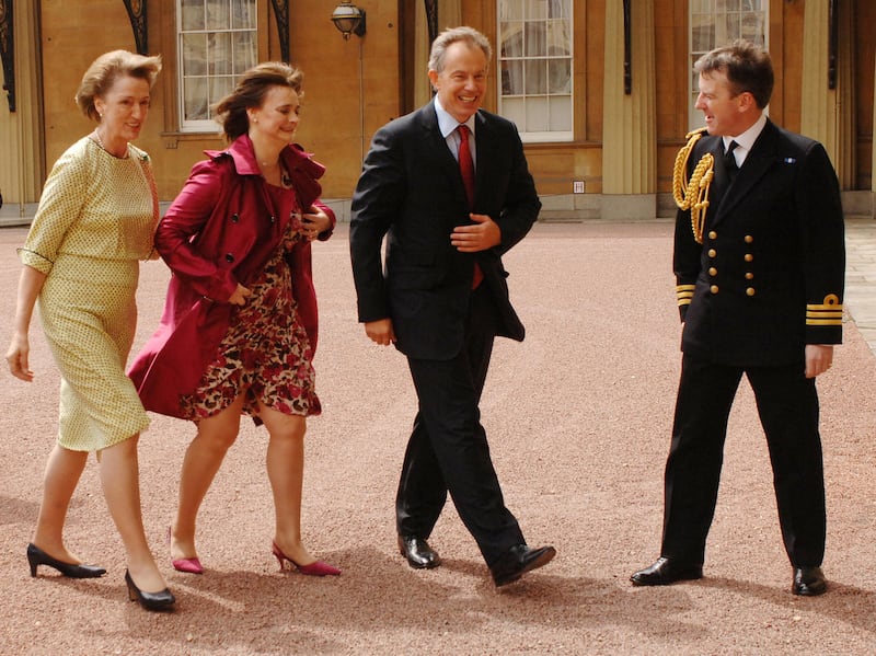 Then-PM Tony Blair, accompanied by wife Cherie, is greeted by the late Queen’s Lady in Waiting, Lady Susan Hussey, and equerry Heber Ackland as he arrives to tender his resignation in 2007