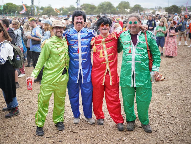 Glastonbury revellers dressed as the Beatles
