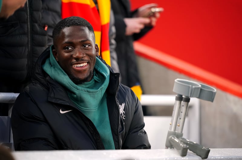 Ibrahima Konate with crutches in the stands during the game against Manchester City