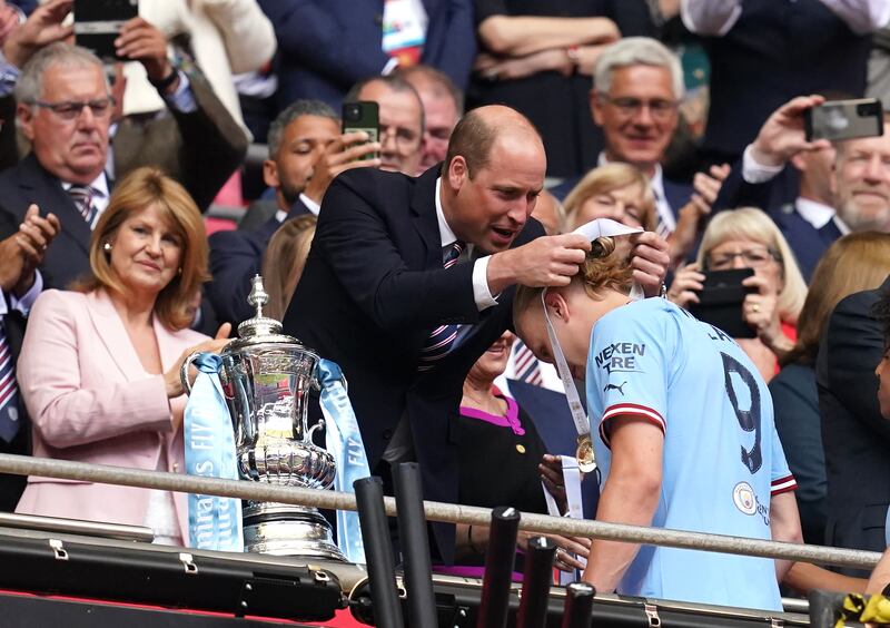 The Prince of Wales presents a winners’ medal to Manchester City’s Erling Haaland following the 2023 FA Cup final