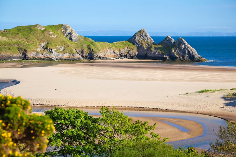 Beautiful coastal view of the Three Cliffs Bay in the Gower, Wales