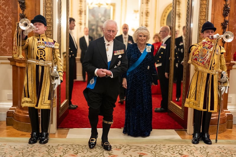 The King, in his knee breeches, and Queen at the Diplomatic Corps reception