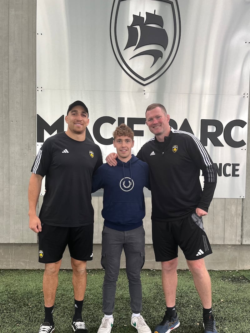 Ultan Dillane (left) and Donnacha Ryan (right) stand with Jack Madden at Stade Rochelais' impressive Macif Parc training ground.