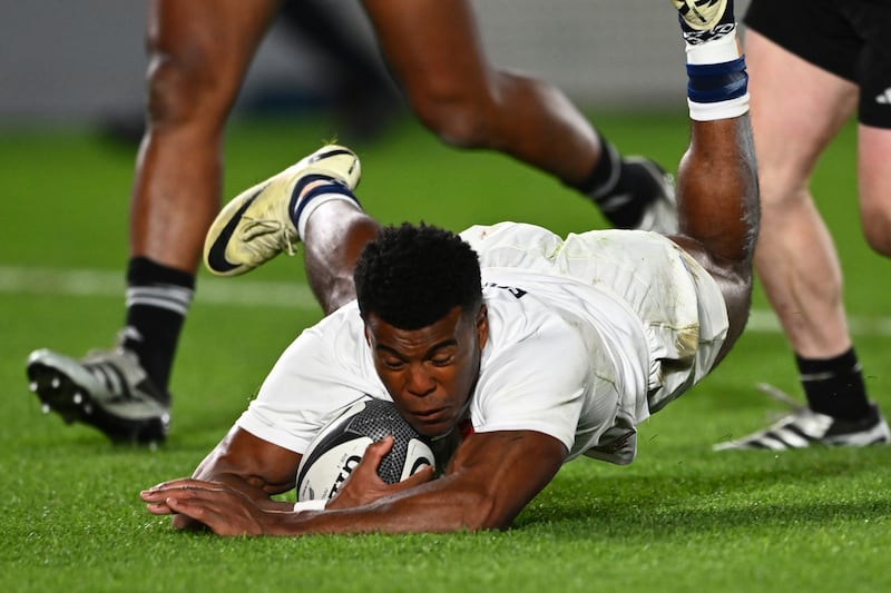 Immanuel Feyi-Waboso scored England’s first try (Kerry Marshall/photosport via AP)