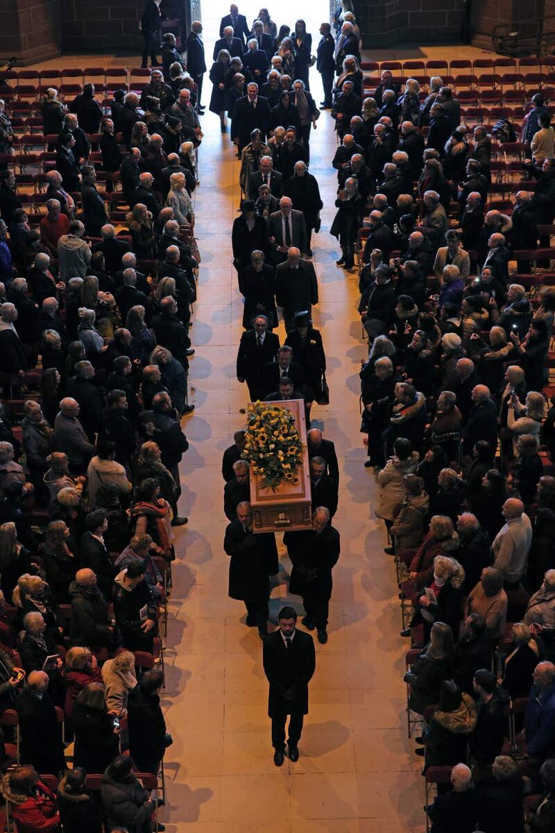 The coffin is carried in during the funeral service (Aaron Chown/PA)