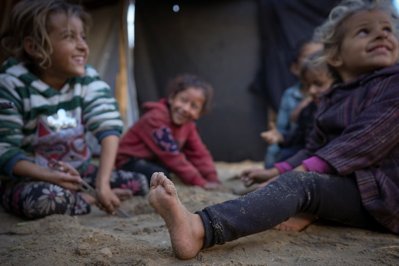 Few children have appropriate clothing for the winter months (Abdel Kareem Hana/AP)