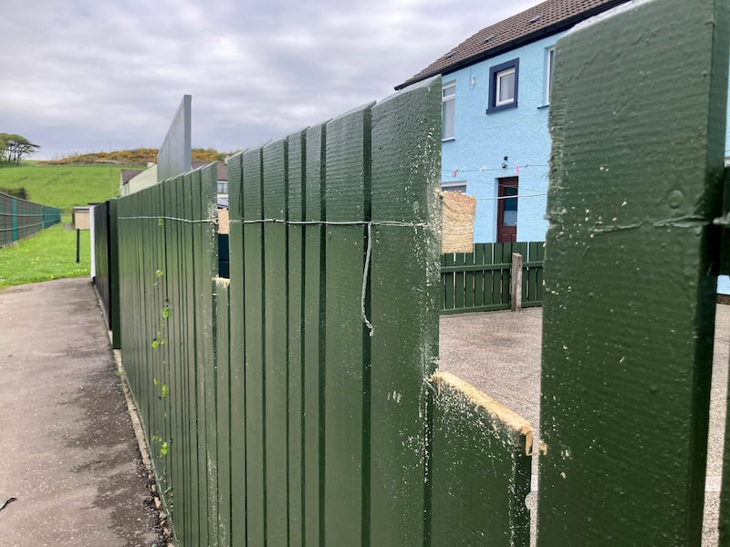 Scene at Bushmills in Co-Antrim where a man had his hands nailed to a fence and two vans were burnt out. Graffiti was also painted on a public toilet block in the popular tourist town close to the Giants Causeway. Picture Margaret Mclaughlin 5-5-2024