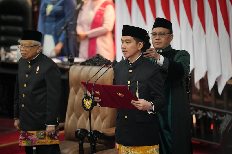 Gibran Rakabuming Raka, the eldest son of outgoing president Joko Widodo, is sworn in as Indonesia’s new vice president (Tatan Syuflana/AP)