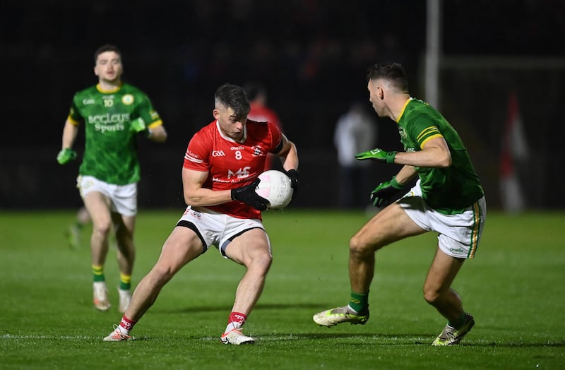 Richie Donnelly attempts to take on a Dungannon defender on his way to two points during Trillick's win in the Tyrone SFC semi-final