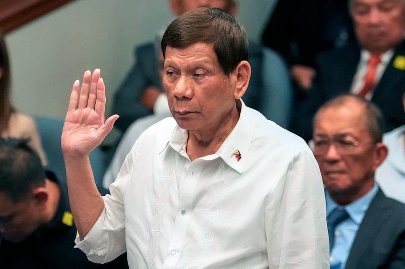 Mr Duterte denied ordering police to kill drug dealers (AP)