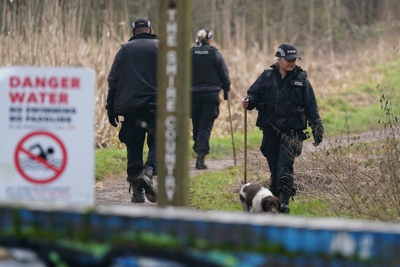 Police at the scene near Scribers Lane, Hall Green