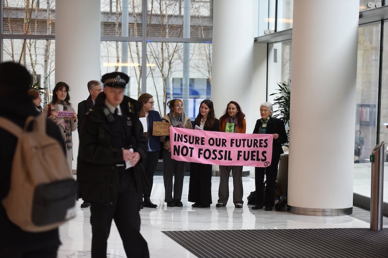 Protesters in the lobby of 20 Fenchurch Street to target insurer Tokio Marine. (Gareth Morris/Extinction Rebellion)