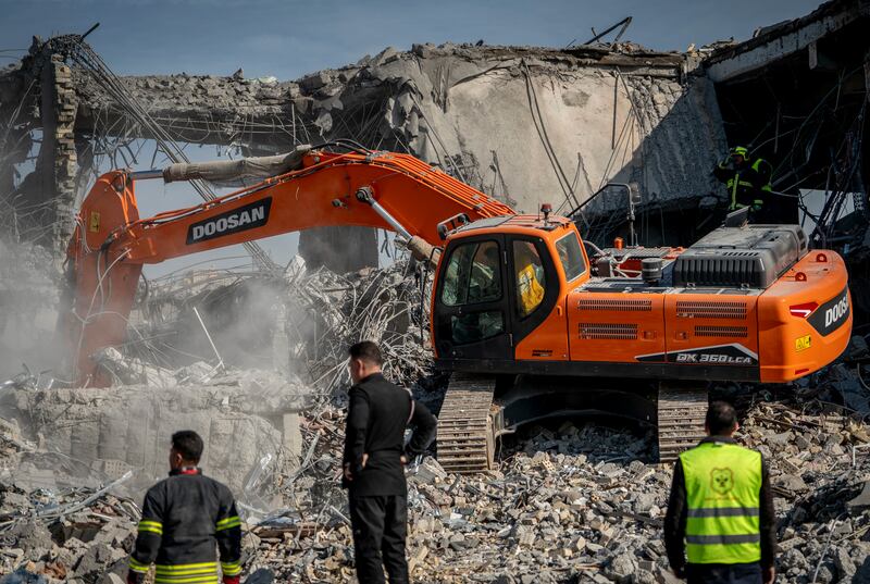 Emergency services clear the rubble of the house of Peshraw Dizayi that was hit in Iranian missile strikes in Irbil, Iraq on Tuesday (Julia Zimmermann/Metrography/ AP)