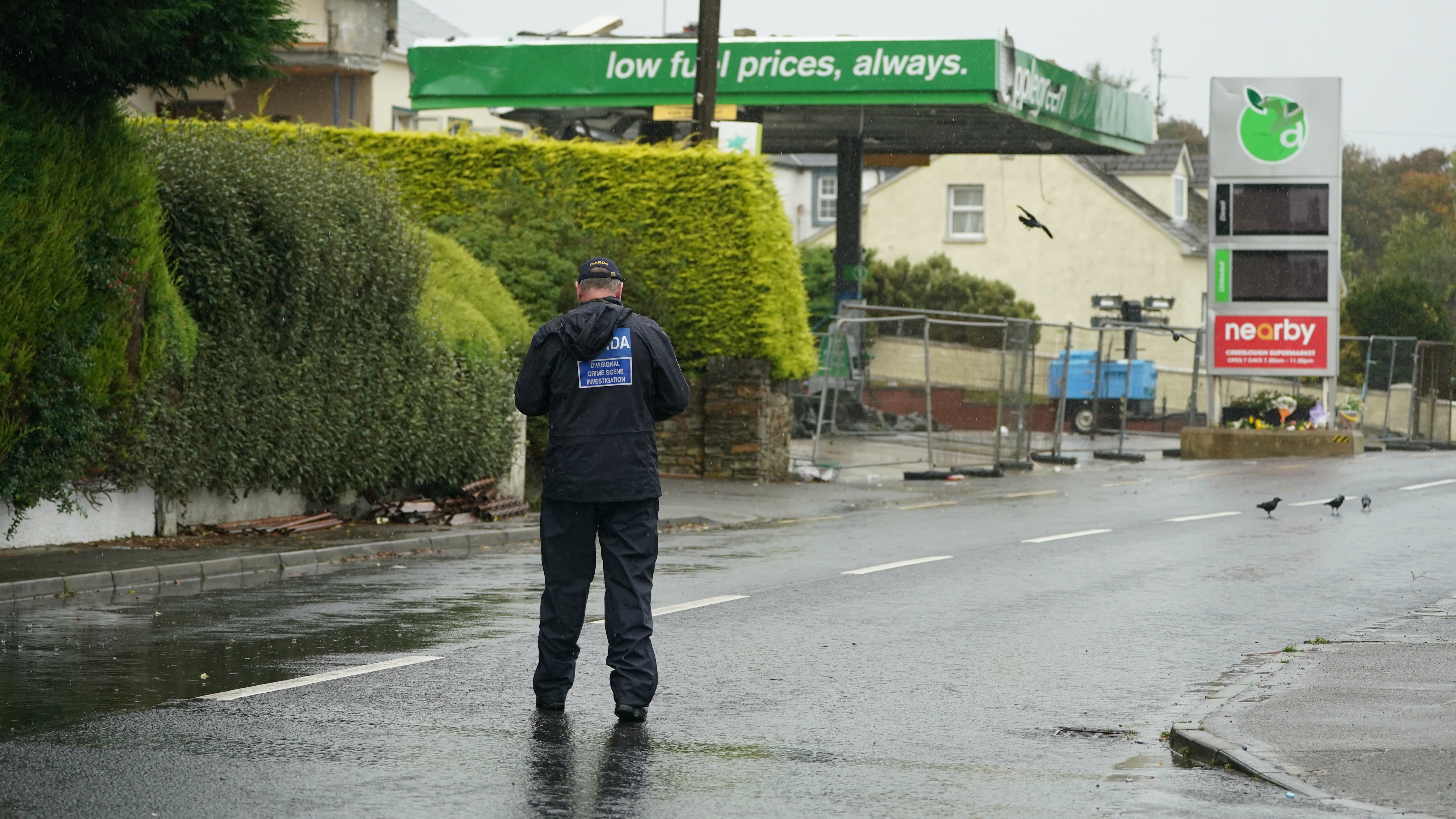 A Garda crime scene investigator at the scene of an explosion at Applegreen service station in the village of Creeslough in Co Donegal, where 10 people were killed