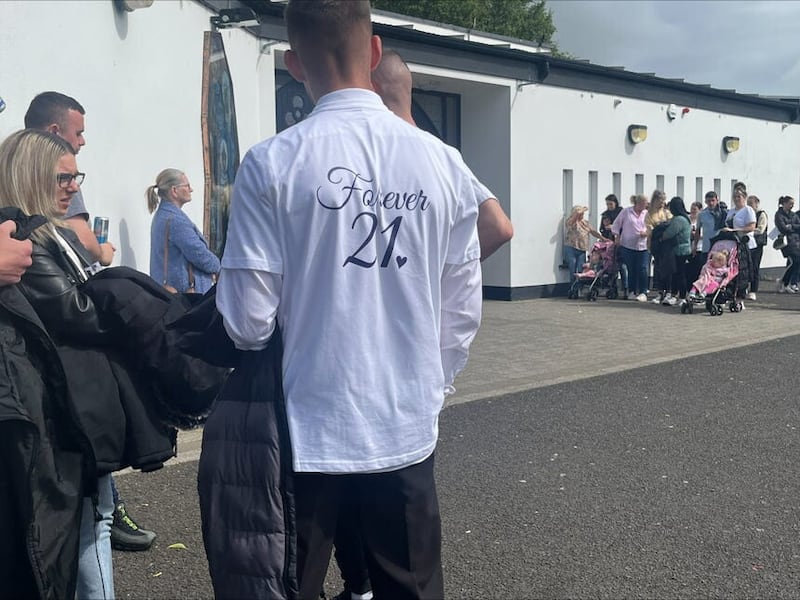 Mourner at the funeral of Rebecca Browne, wearing a t shirt with ‘Forever 21’ written on the back. Ms Browne died aged 21 -years-old after being hit by a Garda car. (Claudia Savage/PA)