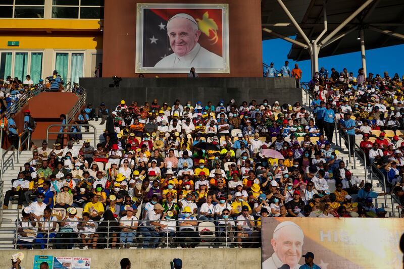 The faithful wait for Pope Francis at the Sir John Guise Stadium in Papua New Guinea’s capital, Port Moresby (Gregorio Borgia/AP)