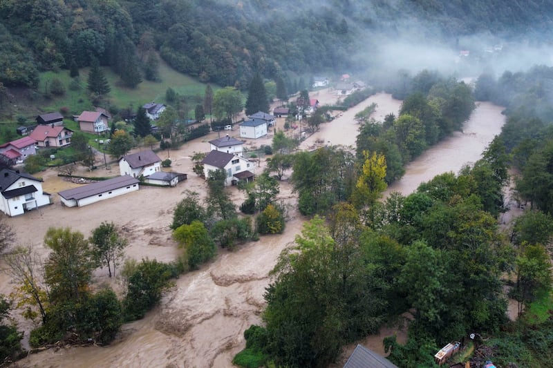 Flooded houses after heavy rain in the village of Luke, near the Bosnian town of Fojnica , 50 kilometres (31 miles) west of Sarajevo, Bosnia (Robert Oroz/AP)