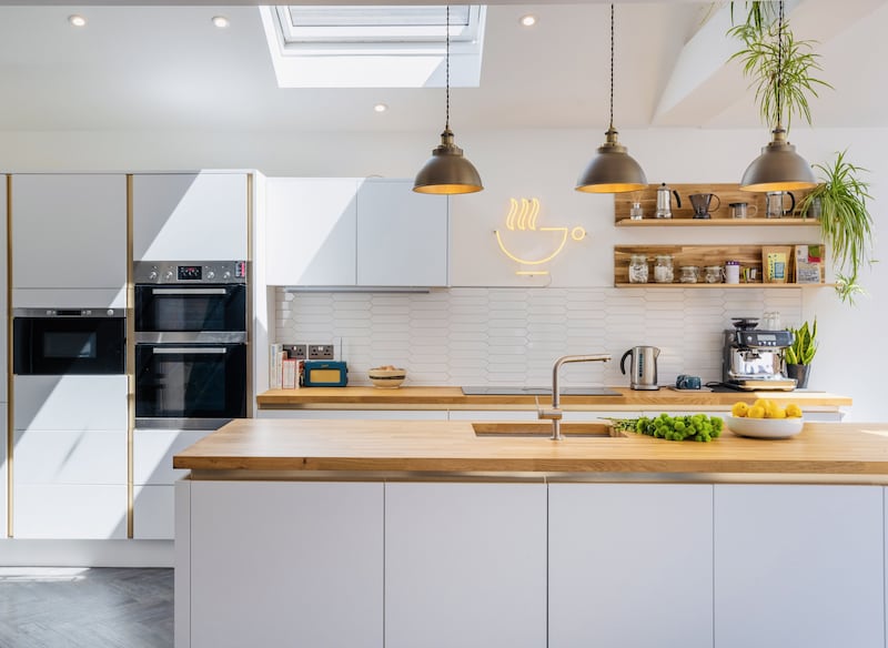 A ground floor reconfiguration creates an inviting open kitchen, dining and living area