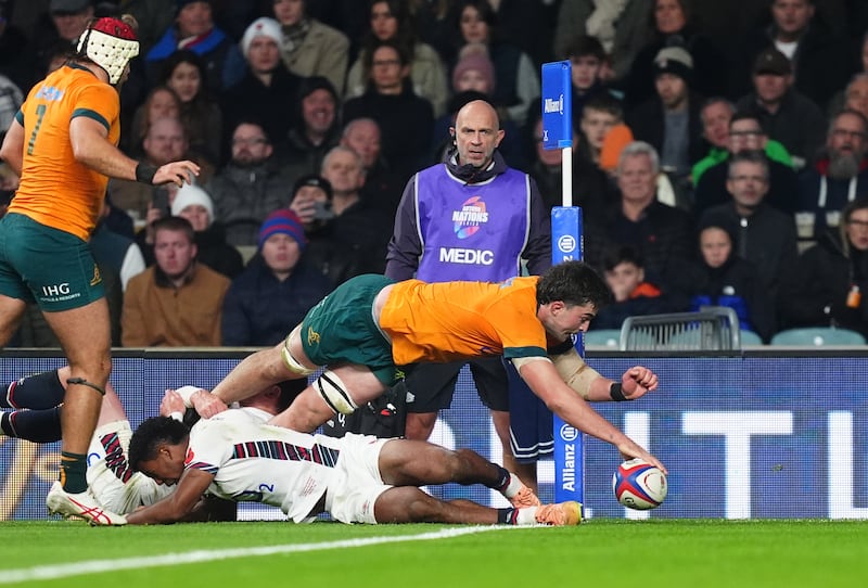 Australia’s Jeremy Williams scores against England