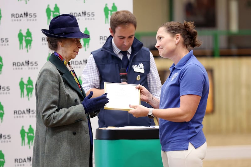 The Princess Royal presents an award during the Riding for the Disabled Association National Championships