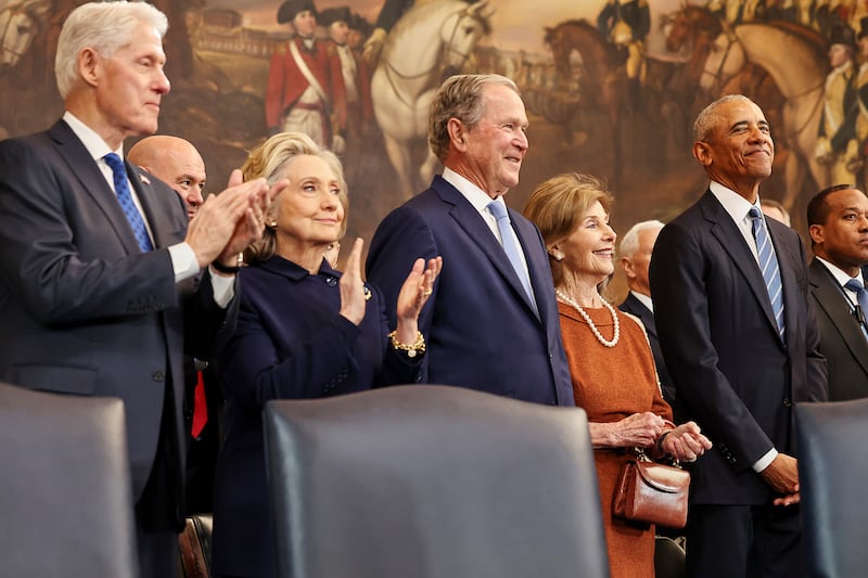 From left, former president Bill Clinton, former secretary of state Hillary Clinton, former president George W Bush, former first lady Laura Bush and former president Barack Obama, arrive before the 60th Presidential Inauguration in the Rotunda of the US Capitol in Washington (Chip Somodevilla/Pool Photo via AP)