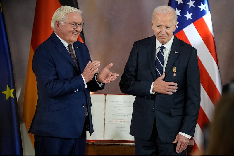 US President Joe Biden after receiving Germany’s Grand Cross special class of the Order of Merit from German President Frank-Walter Steinmeier at Bellevue Palace in Berlin (Matthias Schrader/AP)