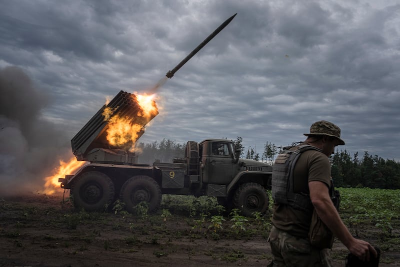 Ukrainian forces shoot toward Russian positions at the front line in Kharkiv region, Ukraine (Evgeniy Maloletka/AP)