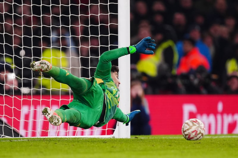 Manchester United goalkeeper Altay Bayindir saves Kai Havertz’s penalty