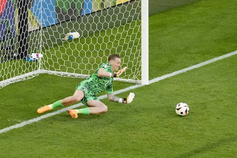 England goalkeeper Jordan Pickford saves the penalty from Switzerland’s Manuel Akanji, not pictured