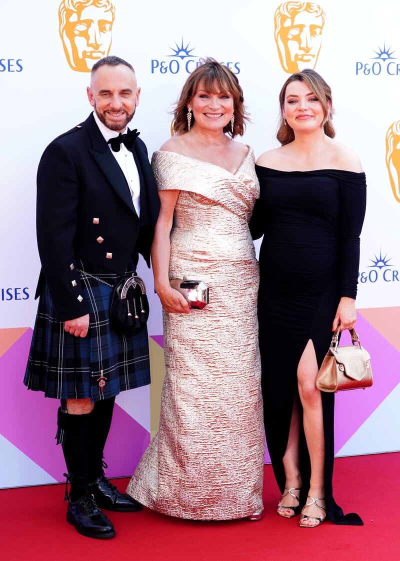 Mark Heyes, Lorraine Kelly and Rosie Smith attending the Bafta TV Awards 2024