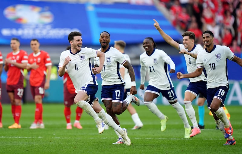 England celebrate their penalty shootout win over Switzerland .