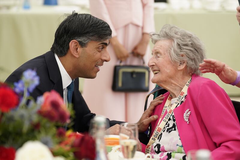 Prime Minister Rishi Sunak meets 100-year-old Wren veteran Marjorie Hutchens during a lunch for veterans and VIPs following the UK’s national commemorative event for the 80th anniversary of D-Day in Portsmouth