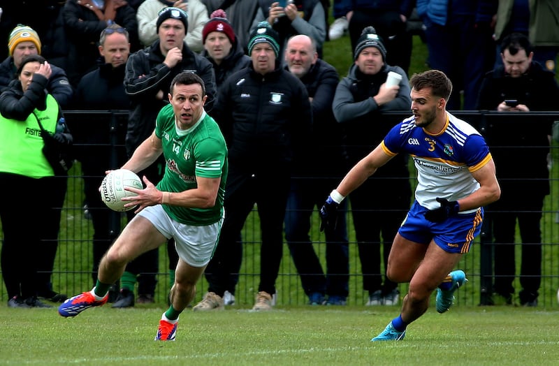 Cargin's Michael Mc Cann in action with   St Brigid's Joseph Finnegan in yesterdays Semi Final game at Dunsilly