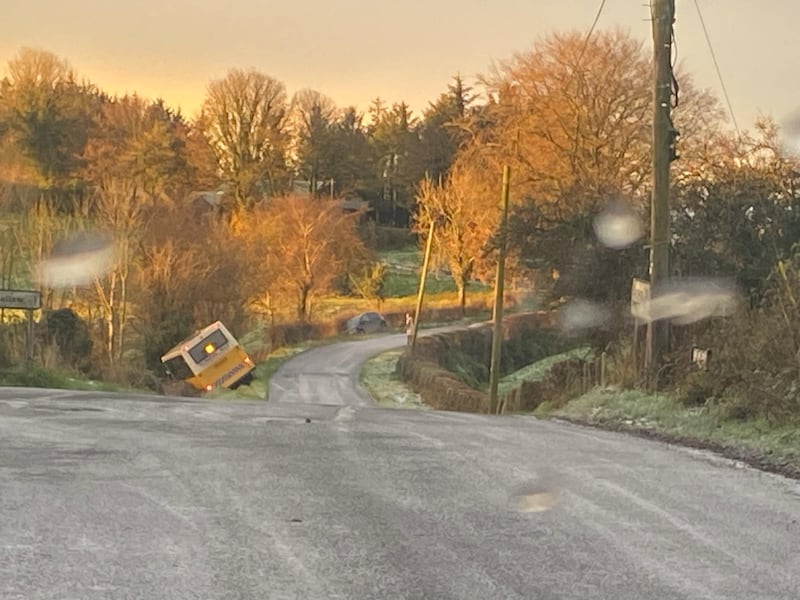 Another vehicle can be seen in the ditch just metres from the school bus